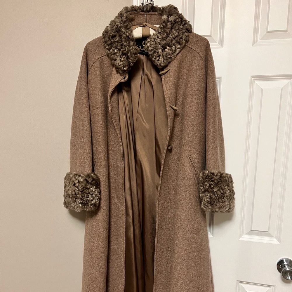 Vintage wool coat with curly wool collar and cuffs. Fits sm-med.